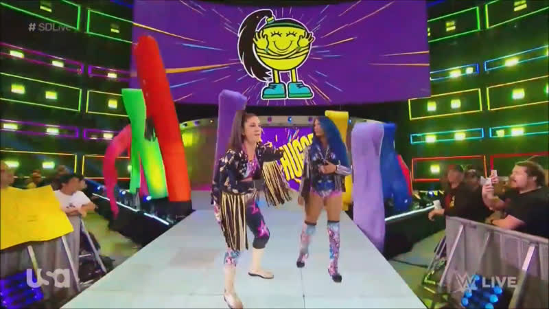 Bayley and Sasha Banks Vs Charlotte Flair and Carmella - TokyVideo